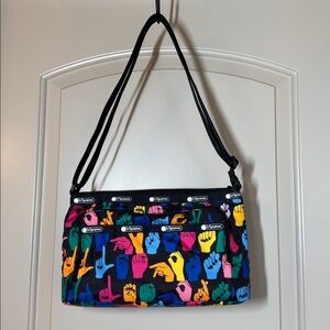 LeSportsac black with colorful sign language.